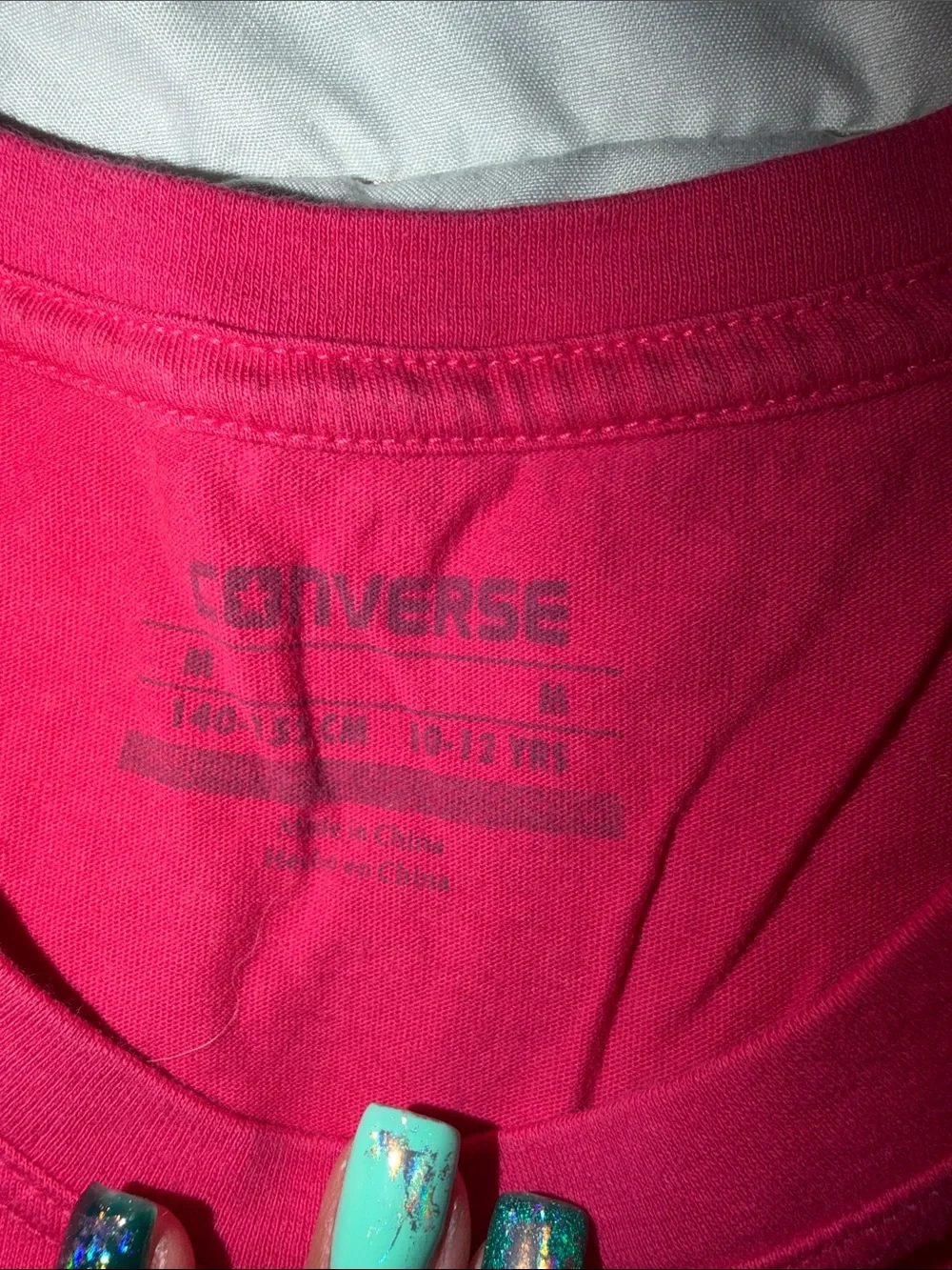 hot pink Tshirt by Converse All Star, Chuck Taylor, print has some sparkle to it